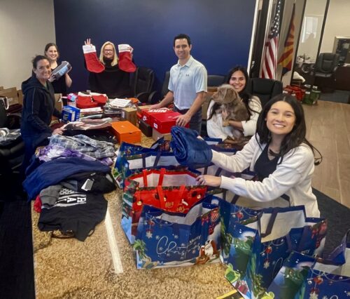 Spreading Joy, The Dream Team Delivers Christmas Gifts to Sunshine Residential Foster Homes